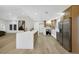 Kitchen featuring a large island with breakfast bar and stainless steel appliances at 2817 Billy Casper Dr, Las Vegas, NV 89134