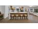 Bright kitchen with a center island, breakfast bar, and modern appliances at 2817 Billy Casper Dr, Las Vegas, NV 89134