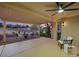 Covered patio with seating and views of the lush golf course at 2817 Billy Casper Dr, Las Vegas, NV 89134