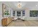 Relaxing sitting area with bay window, comfortable chairs, and a stylish decor at 2817 Billy Casper Dr, Las Vegas, NV 89134