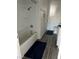 Bright bathroom featuring a tub-shower combo and ample vanity space at 330 N 9Th St, Las Vegas, NV 89101