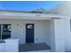 Charming entrance with a blue door and freshly painted exterior at 330 N 9Th St, Las Vegas, NV 89101