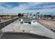 Charming white home with a large driveway and a well-maintained front yard at 330 N 9Th St, Las Vegas, NV 89101
