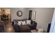 Comfortable living room with a brown sectional and decor at 330 N 9Th St, Las Vegas, NV 89101