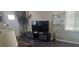 Well-lit living room showcasing a TV with modern decor and plants at 330 N 9Th St, Las Vegas, NV 89101