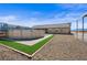 This backyard features an above ground pool with desert landscaping and privacy fencing at 340 Domingo St, Pahrump, NV 89048