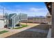 Backyard featuring stairs to a partial pool structure, a mountain view and minimal landscaping at 340 Domingo St, Pahrump, NV 89048