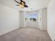 Bright bedroom with a ceiling fan and a window nook offers lots of natural light at 340 Domingo St, Pahrump, NV 89048