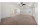 Spacious main bedroom with neutral walls, plush carpet, and an attached bathroom at 340 Domingo St, Pahrump, NV 89048