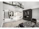 Elegant foyer with a grand staircase, a fireplace, and stylish decor at 3465 Pama Ln, Las Vegas, NV 89120