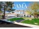 Stunning two-story home with a beautifully landscaped front yard and circular driveway at 3465 Pama Ln, Las Vegas, NV 89120