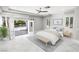 Bright and airy main bedroom with a private outdoor access, neutral tones, and ample natural light at 3465 Pama Ln, Las Vegas, NV 89120