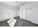 Bright bedroom with white walls, carpeted floor, and a spacious sliding door closet at 3726 Shaving Shadows Ave, North Las Vegas, NV 89032