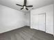 Well-lit bedroom features carpeting, a ceiling fan, and a closet for ample storage at 3726 Shaving Shadows Ave, North Las Vegas, NV 89032