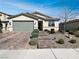 Charming single-story home featuring a well-manicured lawn and a spacious driveway at 3726 Shaving Shadows Ave, North Las Vegas, NV 89032