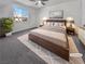 Tranquil main bedroom featuring a large window and contemporary decor at 3726 Shaving Shadows Ave, North Las Vegas, NV 89032