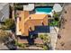 Bird's eye view of an impressive desert home boasting a private pool and meticulous landscaping at 380 Claremont St, Boulder City, NV 89005