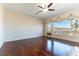 Large bedroom with hardwood floors and balcony access with mountain views at 380 Claremont St, Boulder City, NV 89005