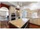 Bright, open kitchen with stainless steel appliances and granite countertops at 380 Claremont St, Boulder City, NV 89005