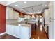 Large kitchen featuring granite countertops, stainless appliances, and an island with bar seating at 380 Claremont St, Boulder City, NV 89005