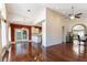 Open concept living area with hardwood floors and view of the kitchen at 380 Claremont St, Boulder City, NV 89005