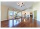 Bright living room with hardwood floors and access to a covered balcony at 380 Claremont St, Boulder City, NV 89005