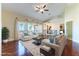 Bright living room featuring hardwood floors, vaulted ceilings, and elegant furniture at 380 Claremont St, Boulder City, NV 89005