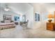 Bedroom featuring vaulted ceiling, ceiling fan, and carpet flooring for a relaxing space at 4032 Bola Dr, North Las Vegas, NV 89032