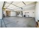Spacious garage with ample storage cabinets and overhead lighting at 4032 Bola Dr, North Las Vegas, NV 89032