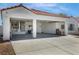 Open and airy garage featuring abundant storage, a water heater, and an uncluttered design at 4032 Bola Dr, North Las Vegas, NV 89032