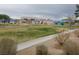 A neighborhood park featuring covered picnic areas, aquatic center and a mural on the side of a building at 4032 Bola Dr, North Las Vegas, NV 89032