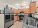 Well-equipped kitchen featuring stainless steel appliances and plenty of storage space at 4615 Puglia Ln # 201, North Las Vegas, NV 89084