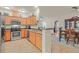 Functional kitchen with stainless steel appliances, granite countertops, and ample cabinet space at 4615 Puglia Ln # 201, North Las Vegas, NV 89084