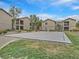 Well-maintained tennis court surrounded by lush landscaping and residential buildings at 4615 Puglia Ln # 201, North Las Vegas, NV 89084