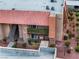 Aerial view of an apartment complex with red brick and well-maintained landscaping at 5097 Indian River Dr # 172, Las Vegas, NV 89103