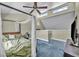 Bright bedroom with large windows and a vaulted ceiling, complete with modern furnishings and ample natural light at 5157 Garden Ln # F, Las Vegas, NV 89119