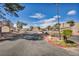 Well-maintained street view in a quiet neighborhood with mature trees and neatly landscaped yards at 5157 Garden Ln # F, Las Vegas, NV 89119