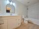This bathroom showcases a vanity and a shower-tub combo with tiled walls at 5161 Lindell Rd # 104, Las Vegas, NV 89118