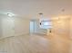 Open-concept living area with plenty of natural light and hard surface flooring at 5161 Lindell Rd # 104, Las Vegas, NV 89118