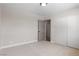 This bedroom features neutral walls, carpet flooring, and a closet for ample storage at 5832 Arandas Ct, Las Vegas, NV 89103