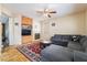 Cozy living room with a fireplace, built-in shelves, and comfortable seating at 6177 W Cougar Ave, Las Vegas, NV 89139