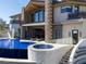 The backyard features a pool, and a spa at 64 Promontory Ridge Dr, Las Vegas, NV 89135