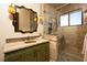 Elegant bathroom with decorative wall tiling, glass shower, and vintage style fixtures at 64 Promontory Ridge Dr, Las Vegas, NV 89135