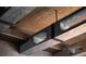 Unique ceiling design featuring exposed beams with inset lighting at 64 Promontory Ridge Dr, Las Vegas, NV 89135
