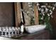 Stylish decor featuring elegant glassware, a wine bottle, and a decorative marble bowl at 64 Promontory Ridge Dr, Las Vegas, NV 89135
