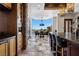 Stunning dining room boasts floor-to-ceiling windows and city views at 64 Promontory Ridge Dr, Las Vegas, NV 89135