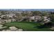 Golf course view with a sand trap and a beautiful view of the city skyline in the background at 64 Promontory Ridge Dr, Las Vegas, NV 89135