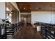 Spacious hallway with hardwood floors, elegant railings, and natural light, offering a sophisticated transition at 64 Promontory Ridge Dr, Las Vegas, NV 89135