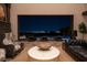 Chic living room features city views, comfortable furniture and modern decor at 64 Promontory Ridge Dr, Las Vegas, NV 89135