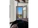 A view of the surrounding neighborhood from the main bedroom at 64 Promontory Ridge Dr, Las Vegas, NV 89135